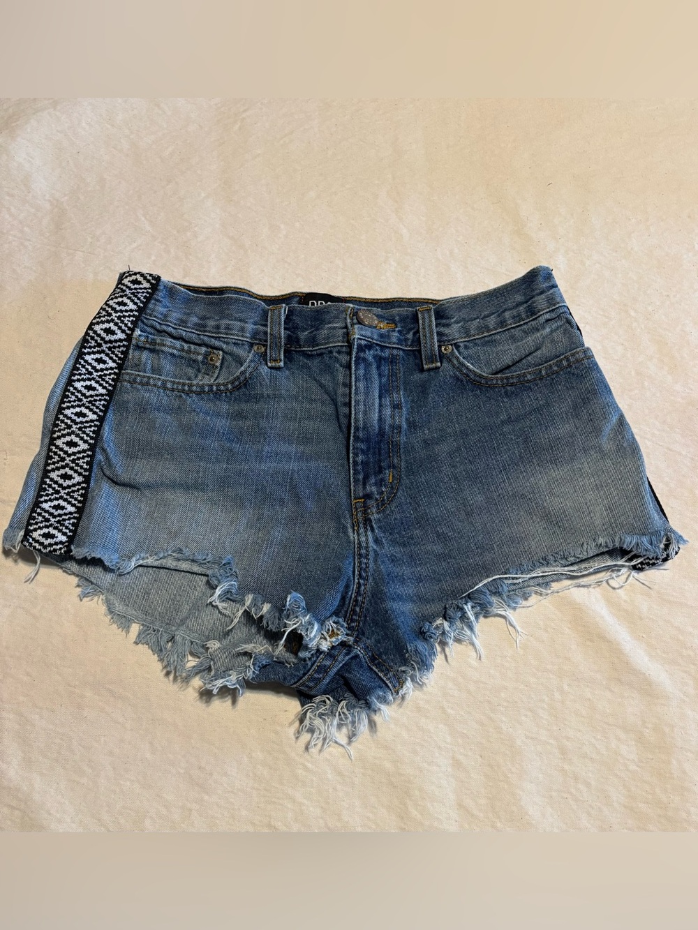 BDG Faded Blue Distressed Denim Cutoff Shorts with Black-White Side Trim